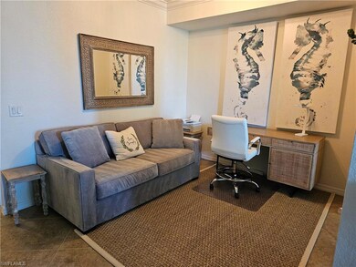 Home office with tile patterned flooring and ornamental molding