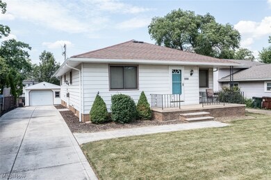 View of front facade with detached garage