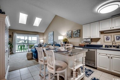 Kitchen featuring a sink, visible vents, white cab