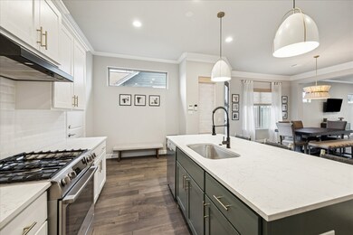 The kitchen features Bosch appliances and a walk-in pantry.