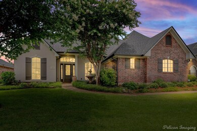 View of front of property with a lawn