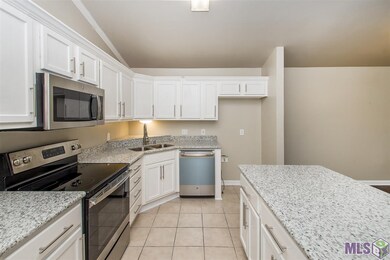 Brand new kitchen with matching stainless steel GE