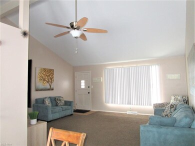 View of the front door entry into the living room.