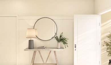 Welcoming foyer with feature wall (*Artist renderi