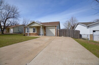 Long driveway with RV/boat parking on the side.