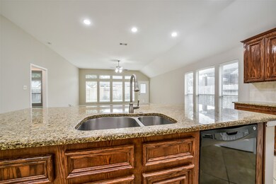 A view from the kitchen towards the family room.