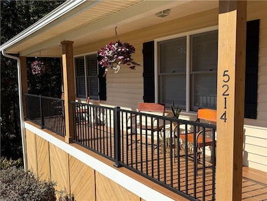 View of porch with comercial grade railing