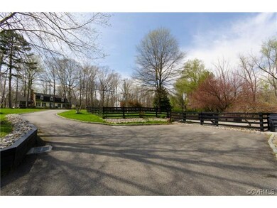 Large driveway with two parking areas and extra sp