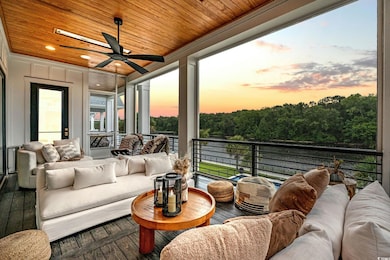 Screened Veranda with Built-in Infratech Heaters for Year-Round Enjoyment