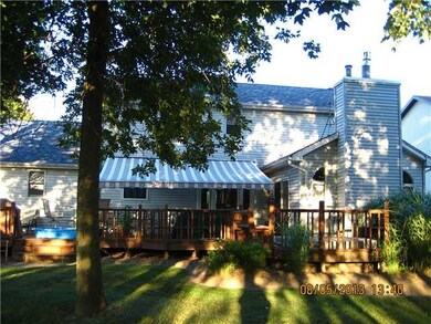 Exterior Back. Lovely deck with retractable awning