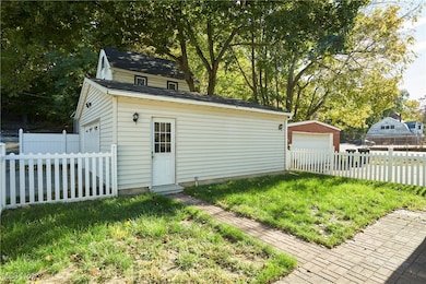 Backyard with walk way to garage