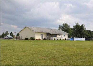 View of the back of the home. Notice the covered d