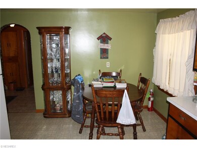 Eating area of Kitchen. Another curved archway on 