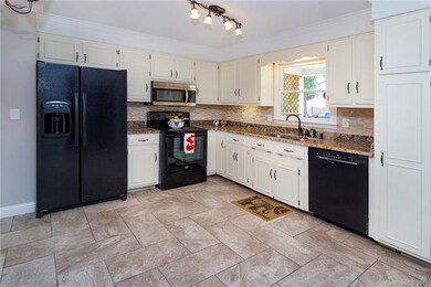 Kitchen with granite countertops...