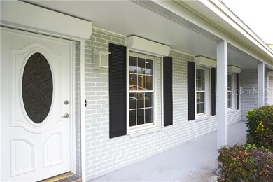 Hurricane Roll Down Shutters - Covered Front Porch
