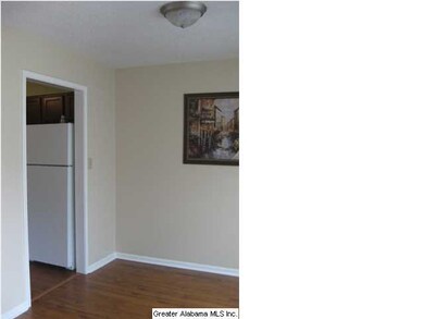 Dining Room has tons of natural light, & laminate 