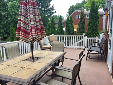 Newly resurfaced patio above garage.