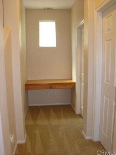 Tech center with laundry room and half bath to the
