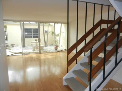Living Room overlooking front open patio