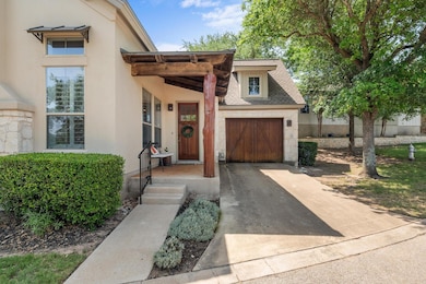 View of front of house featuring concrete drivewa
