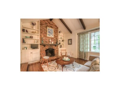 Beautiful brick fireplace and hardwoods.