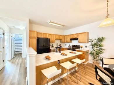 Kitchen features NEW Range, newer                  appliances, large island and generous cupboard space including a pantry