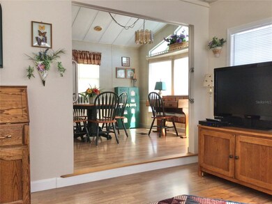 Living room looking into dining room 