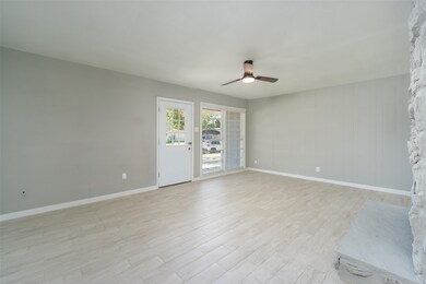 Entryway with Texas sized window letting in a ton
