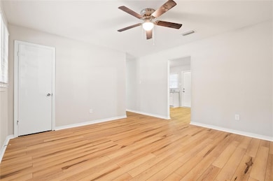 Unfurnished room featuring light hardwood / wood-s