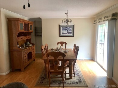 Close up picture of Dining room, patio doors leadi