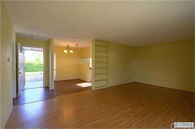 living room/dining room/front door