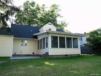 Exterior Back. blue slate patio and large private 
