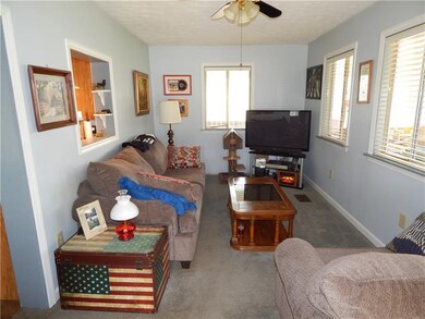 Living Room area on Main Level. Multiple windows p