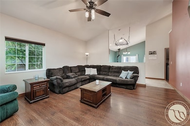 Living room looking through to kitchen, dining and