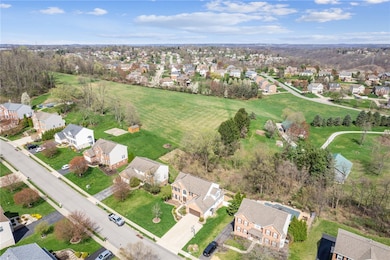 The woods behind the home are part of the lot prov