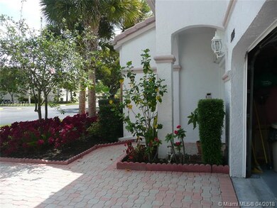 Covered entry to double doors leads to Guest house