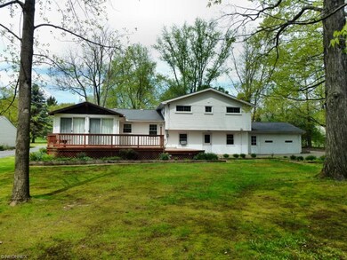 Rear view-faces South, with Vaulted 3 Season Room 