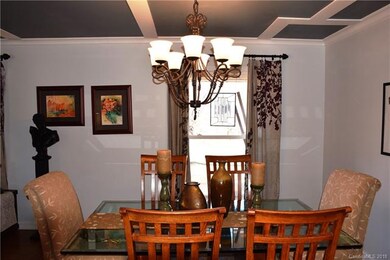The dining area also features this lovely light fi