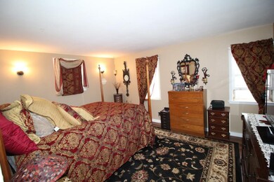Main level master bedroom with full, private maste