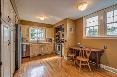 The eat in kitchen is fully equipped with stainles