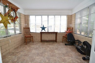 Beautiful sunroom is heated and cooled.