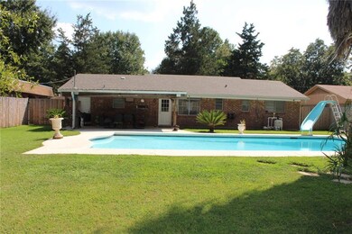 REAR VIEW: LARGE BACK YARD WITH INGROUND GUNITE PO