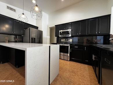 White quartz countertops with waterfall