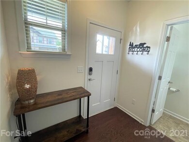 Foyer with half bath & coat closet