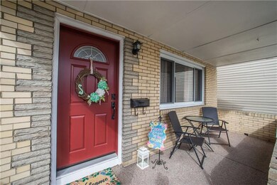 Enjoy warm summer evenings on the covered front po
