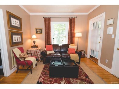 Living room. Entrance into unit and entrance to th