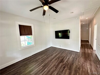 Updated vinyl floors and ceiling fan