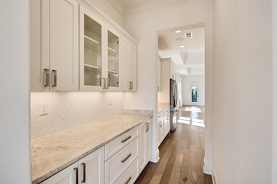 Interior space with dark wood-style flooring, visi