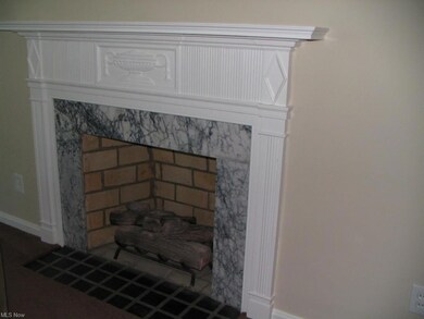 Living Room with fireplace and newer carpeting, fr