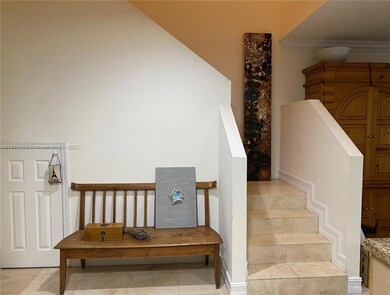 Kitchen/ Open Family Room Area and Stairs to Bedrooms- Additional Storage under the stairs